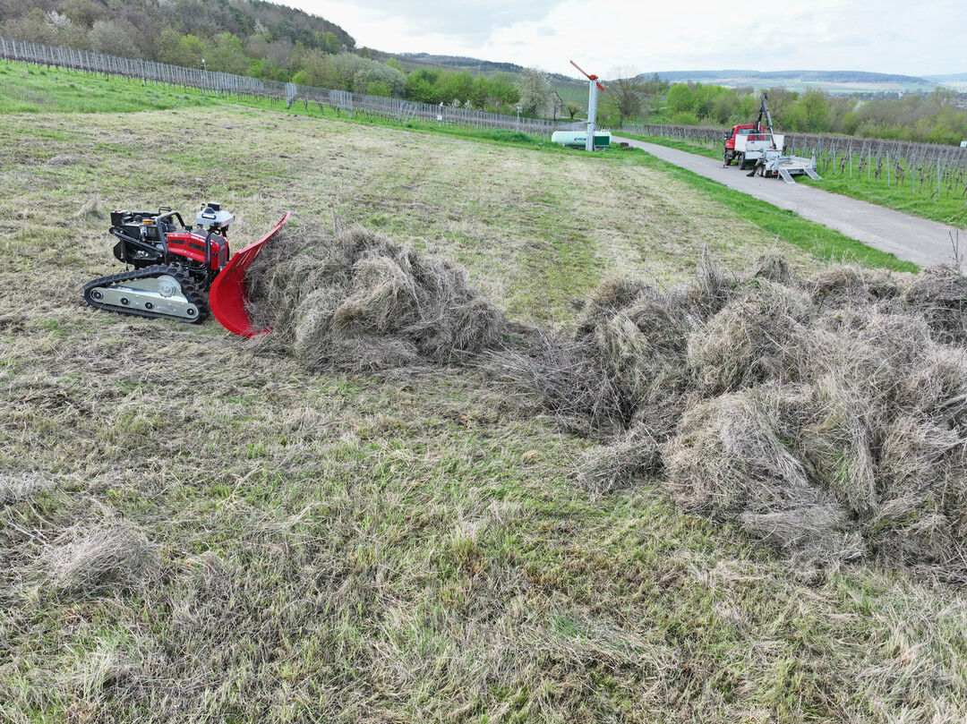 Abrumen von Mhgut mithilfe eines Heuschiebers