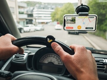 Mit dem vialytics Smart Button kann die 
Integration Verkehrssicherung whrend der 
Fahrt genutzt werden. 